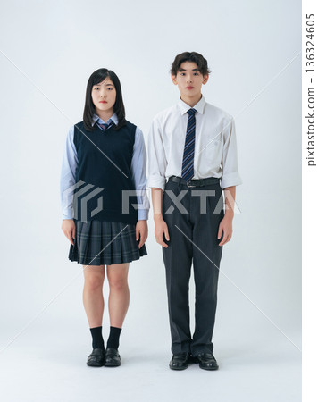 Portrait of male and female students in uniform Portrait of male and female students in uniform 136324605