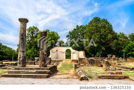 Old Alabama State Capitol ruins in Tuscaloosa. Historic site features stone columns and foundation remains in Capitol Park under a blue sky Old Alabama State Capitol ruins in Tuscaloosa. Historic site features stone columns and foundation remains in Capitol Park under a blue sky 136325150