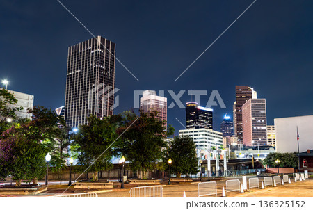 Downtown Atlanta skyline features illuminated skyscrapers including the State of Georgia Building at night. Georgia, United States 136325152