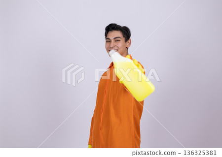 Janitor carrying cleaning equipment on his shoulder 136325381