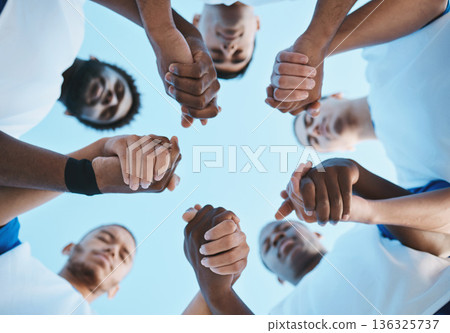 Sports, teamwork and praying with hands of soccer player on field for fitness, support and community. Goal, workout and prayer with people training on football stadium for motivation and game 136325737
