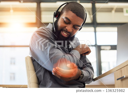 Black man, elbow pain and working in call center, injury and sick with overlay, customer service and health problem. Male agent, CRM and headset with mic, fibromyalgia and muscle tension with glow Black man, elbow pain and working in call center, injury and sick with overlay, customer service and health problem. Male agent, CRM and headset with mic, fibromyalgia and muscle tension with glow 136325982
