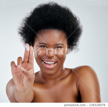 Face, smile and black woman with cream for skincare in studio isolated on white background. Portrait, happy or African model with moisturizer, cosmetic or sunscreen for dermatology, health or beauty 136326076