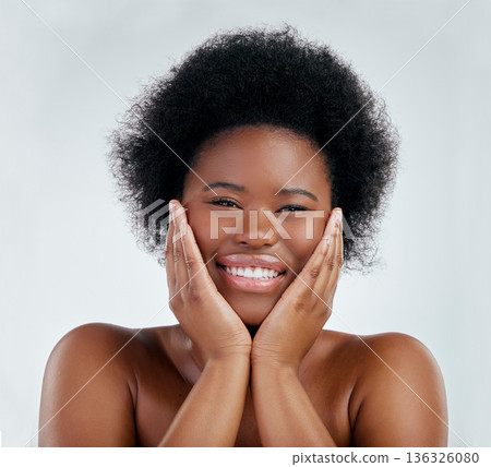 Wellness, beauty and portrait of a woman in studio with a natural, skincare or cosmetic face routine. Health, young and headshot of an African female model with facial dermatology by gray background. 136326080