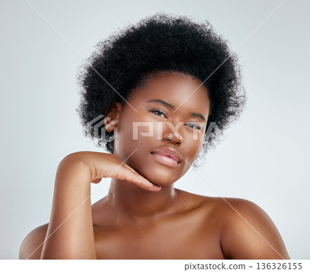Face, beauty and skincare of black woman with confidence in studio isolated on a white background. Portrait, serious and natural model with cosmetic, facial treatment or aesthetic, wellness or health Face, beauty and skincare of black woman with confidence in studio isolated on a white background. Portrait, serious and natural model with cosmetic, facial treatment or aesthetic, wellness or health 136326155