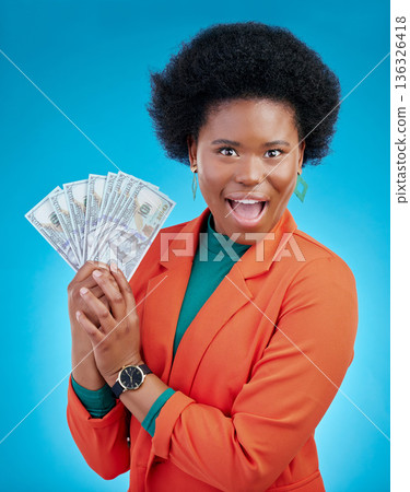 Money, wow and business woman in portrait for winning, cash and lottery fan on blue background. Surprise face, bonus and rich african person or winner for profit, cashback or financial loan in studio 136326418