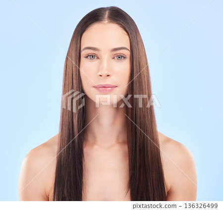 Hair, face and beauty, woman and cosmetic care with keratin treatment isolated on blue background. Female model, haircare and salon hairstyle, Brazilian shine and skin glow with portrait in a studio 136326499