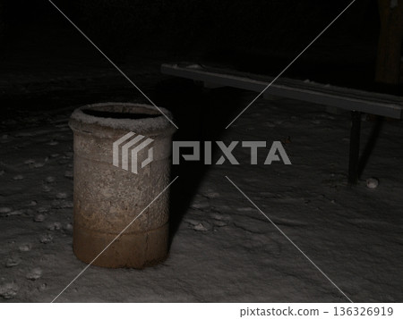 concrete trash can covered with snow on a night alley concrete trash can covered with snow on a night alley 136326919