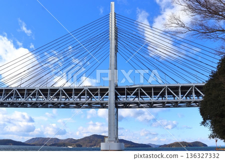 The Seto Ohashi Bridge seen from Iwaguro Island (with the main island on the opposite shore) The Seto Ohashi Bridge seen from Iwaguro Island (with the main island on the opposite shore) 136327332