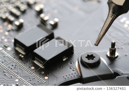 Special screws with hexagonal or triangular heads used in computers and smartphones 136327481