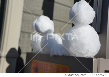 A small snowman A small snowman 136327576