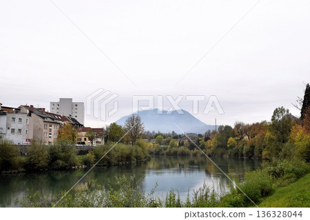 Beautiful European river scenery: calm waters and historic townscapes Beautiful European river scenery: calm waters and historic townscapes 136328044