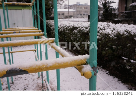 Snow and jungle gym 136328241