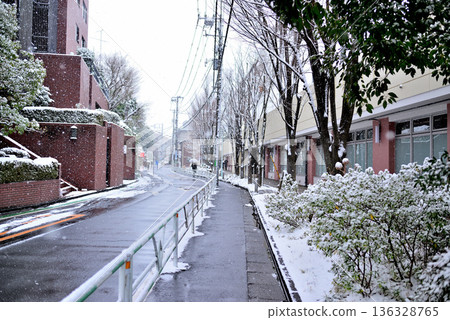 A quiet, upscale residential area with a light snowfall around Yoyogi-Uehara Station in Shibuya Ward, Tokyo A quiet, upscale residential area with a light snowfall around Yoyogi-Uehara Station in Shibuya Ward, Tokyo 136328765