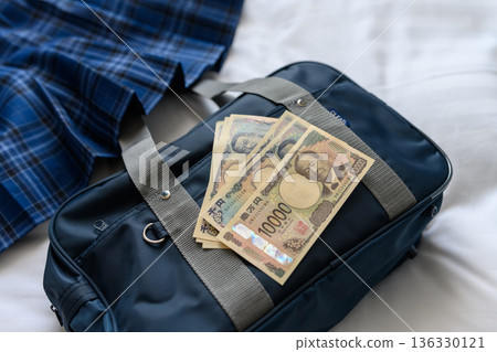 Student bag and money 136330121