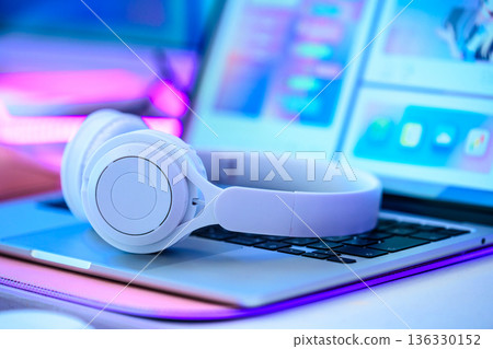 Headphones and laptop Headphones and laptop 136330152
