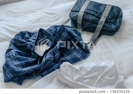 Uniform and bag 136330156