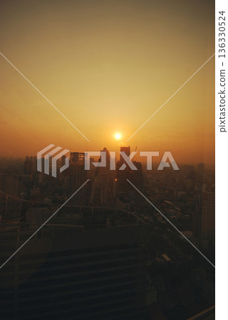 Sunset Amazing Bangkok city skyline with blue sky. Golden time Beautiful skyscraper bangkok midtown landscape. Capital building background modern office district. downtown City night life 136330524