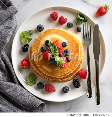 Delicious berry pancakes 136330747