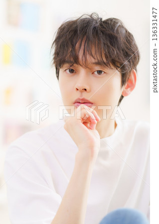 Portrait of a young man, vertical Portrait of a young man, vertical 136331477