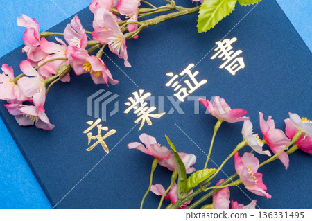 A cheerful background material of a diploma case and cherry blossoms A cheerful background material of a diploma case and cherry blossoms 136331495