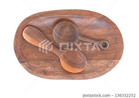 Rustic Wooden Spoons Resting On A Wooden Board For Cooking And Kitchen Prep 136332252