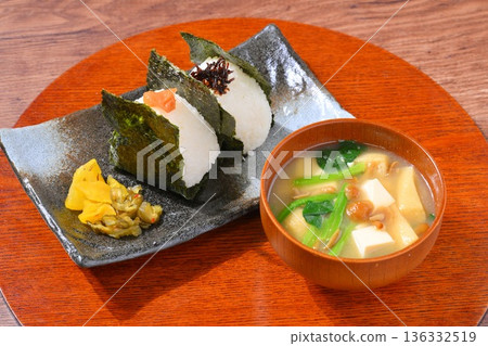Onigiri and miso soup, rice balls and miso soup, Japanese food image. Onigiri and miso soup, rice balls and miso soup, Japanese food image. 136332519