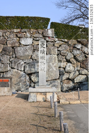 The imposing stone pillar of "Historic Site Himeji Castle" stands in front of the stone wall The imposing stone pillar of "Historic Site Himeji Castle" stands in front of the stone wall 136332635