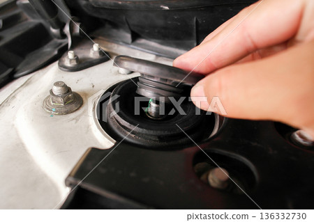 Car Strut Mount Cap Installation on Shock Absorber 136332730