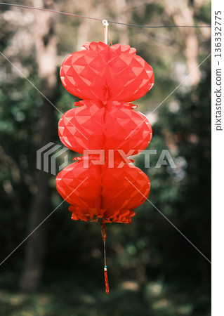 Red lantern decorations hanging outdoors 136332775
