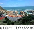 Scenery of a shrine standing on a cliff and the sea 136332836