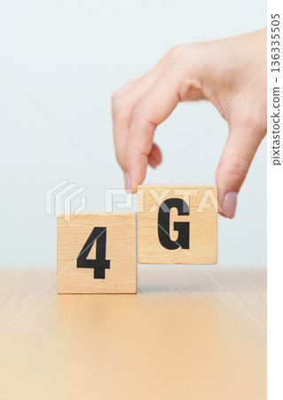 wooden block of 4G, Generation of Cellular Mobile Communications, Technology, network, Social media and digital concepts wooden block of 4G, Generation of Cellular Mobile Communications, Technology, network, Social media and digital concepts 136335505