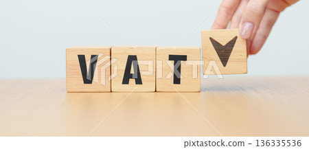 hand change wooden block with VAT text to UP and Down arrow icon. Value Added Tax, decrease and Increase, Taxpayer, Taxable Income, Tax Filing, Deduction, Withholding Tax, Computation and Exemption hand change wooden block with VAT text to UP and Down arrow icon. Value Added Tax, decrease and Increase, Taxpayer, Taxable Income, Tax Filing, Deduction, Withholding Tax, Computation and Exemption 136335536