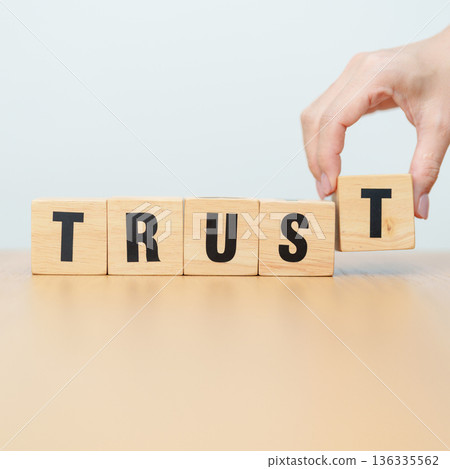 wooden block TRUST. Trustworthy, Truth, beliefs business and agreement concept wooden block TRUST. Trustworthy, Truth, beliefs business and agreement concept 136335562