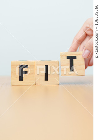 wooden block FIT. Fitness, Exercise, Healthy, Wellness, motivation and wellbeing concepts 136335566