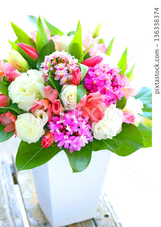 Pale pink spring flower arrangement Pale pink spring flower arrangement 136336374