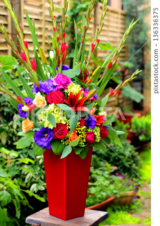 Exotic flower arrangement using gladioli Exotic flower arrangement using gladioli 136336375