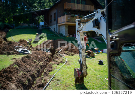 Excavation and installation of underground manhole system. Excavation and installation of underground manhole system. 136337219