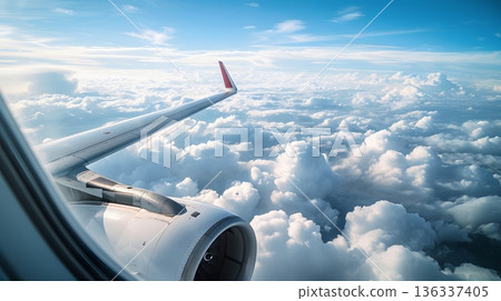 搭乘飛機,翱翔於雲海和藍天之上,體驗空中旅行的樂趣。 搭乘飛機,翱翔於雲海和藍天之上,體驗空中旅行的樂趣。 136337405