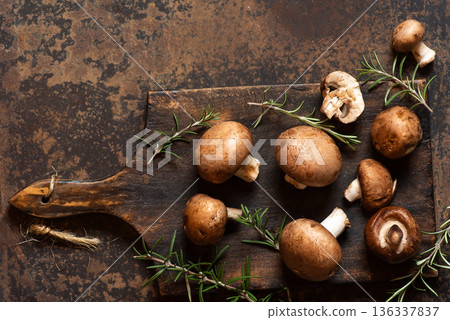 Fresh Mushrooms Displayed On A Rustic Board With Natural Texture Fresh Mushrooms Displayed On A Rustic Board With Natural Texture 136337837