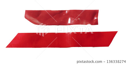 red adhesive tape strips with glossy plastic surface, folds, and slight wrinkles. Long horizontal red adhesive tape strips with glossy plastic surface, folds, and slight wrinkles. Long horizontal 136338274