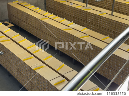 Minsk Belarus June 15 2025 Large library card catalog system from above, long rows of wooden drawers 136338350