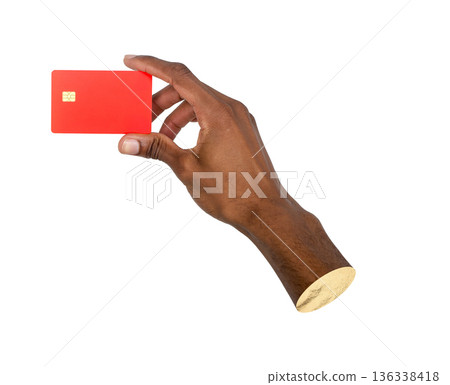 Male hand holding a red bank card between fingers. The card is shown clearly for payment, banking, 136338418