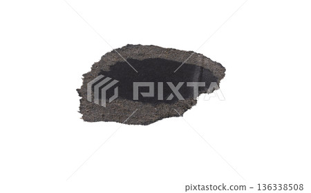 Irregular torn black paper fragment with exposed fibrous cardboard layer and dense matte center. Irregular torn black paper fragment with exposed fibrous cardboard layer and dense matte center. 136338508