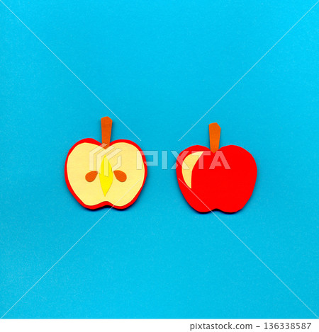 Whole and cross-section apple collage style colored construction paper illustration with background 136338587