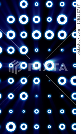 Abstract blue glowing ring pattern arranged in a grid on a dark background, symbolizing digital signals and futuristic technology 136338757