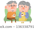 Illustration of a friendly elderly couple enjoying coffee on the sofa 136338791