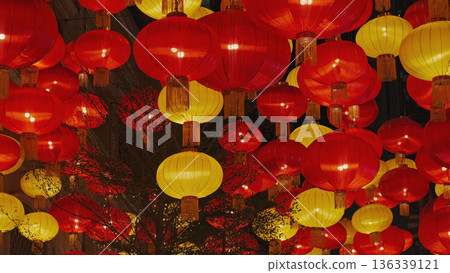 Vibrant red and yellow chinese lanterns at night Vibrant red and yellow chinese lanterns at night 136339121