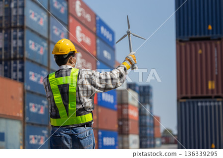 Foreman or worker work at Container cargo site check up goods in container. 136339295