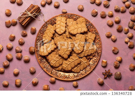 Exquisite Leaf Cookies Served With Hazelnuts And Spices For Delight Exquisite Leaf Cookies Served With Hazelnuts And Spices For Delight 136340728